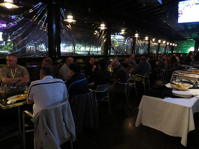 Attendees enjoy a dinner event their first night in Orlando.