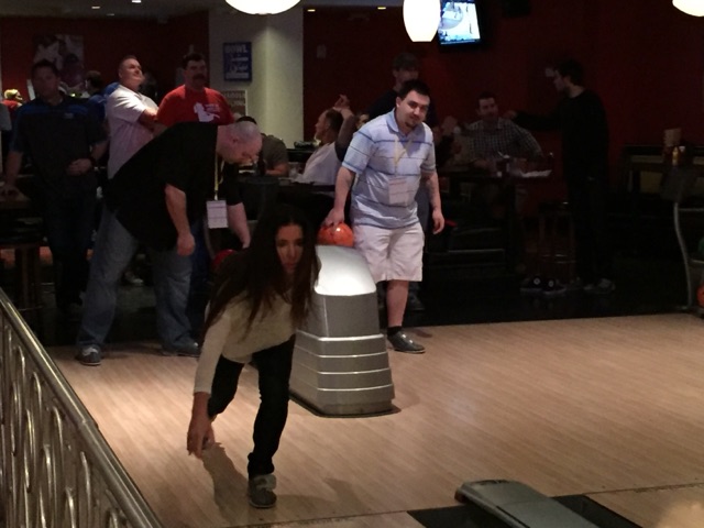 Attendees get competitive with a rousing game of bowling.