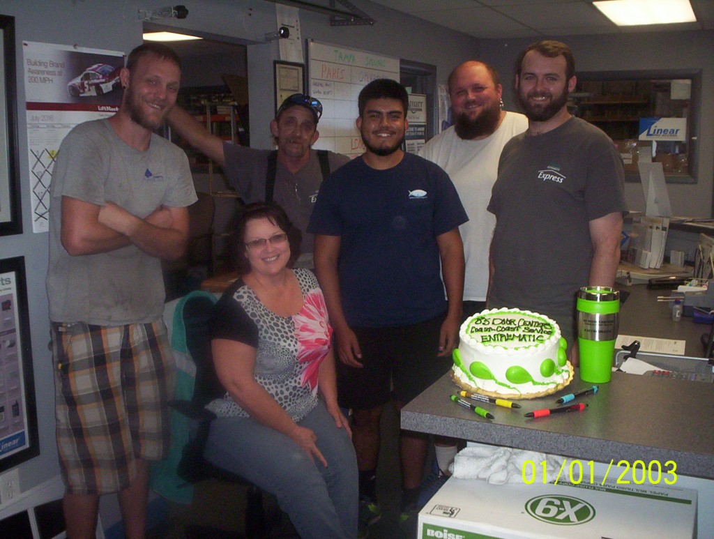 From one corner of the continent to another, Team Members at our Tampa Door Center also celebrated with their commemorative gifts and cake. Pictured from Left to Right: Josh Urbanek, Team Leader; Penni Engleman, Office Assistant; Michael Leonardis, Warehouse; Jose Torres, Management Trainee; Robert Gibson, Warehouse; Robert Weil, Service Manager.
