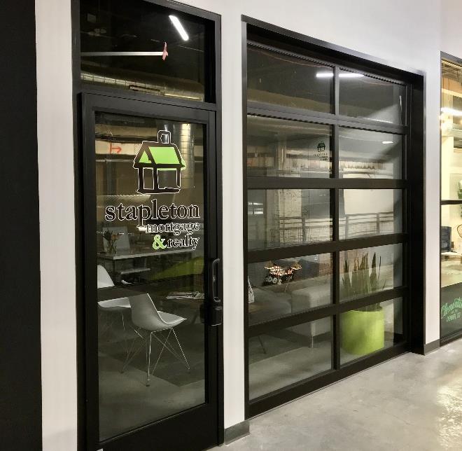 Modern office storefront with aluminum glass sectional door