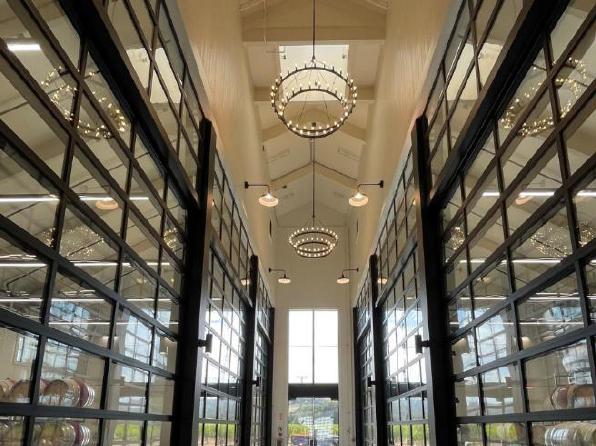 Aluminum full-view doors dividing wine storage rooms