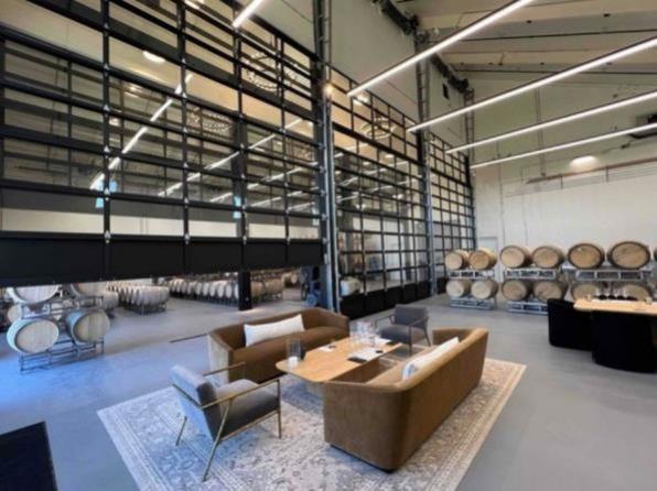 Napa Valley winery interior with glass operable walls