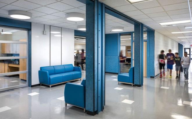 School hallway with glass sectional doors connecting classrooms