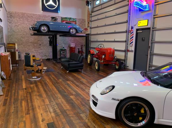 Vehicle storage condo with polished floor and sectional garage door