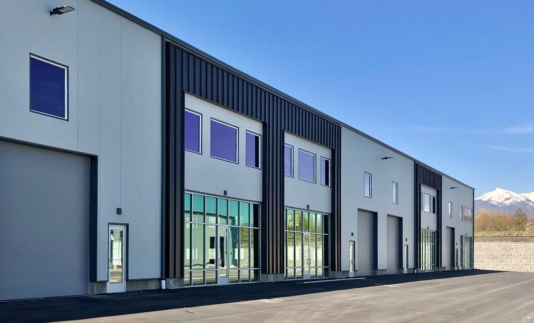 Modern industrial building with large steel sectional doors in Utah