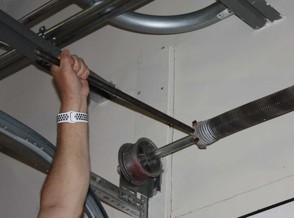 Service Torsion Springs of Commercial Doors